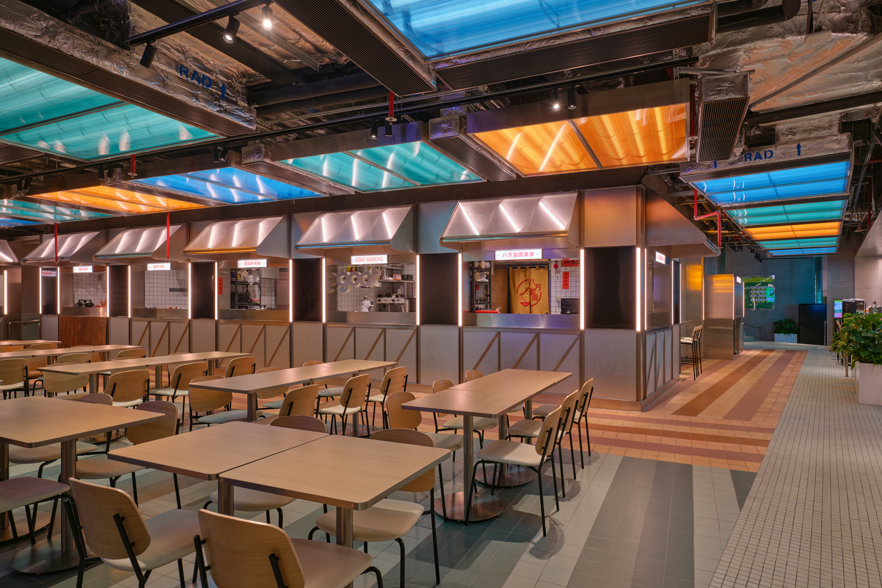 Detail of curved glass corner at NIO Beijing interior lighting store revealing subtle façade textures and precise lighting design for retail store edges.